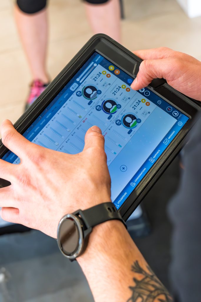 Programme d'électrostimulation affiché sur la tablette du coach
